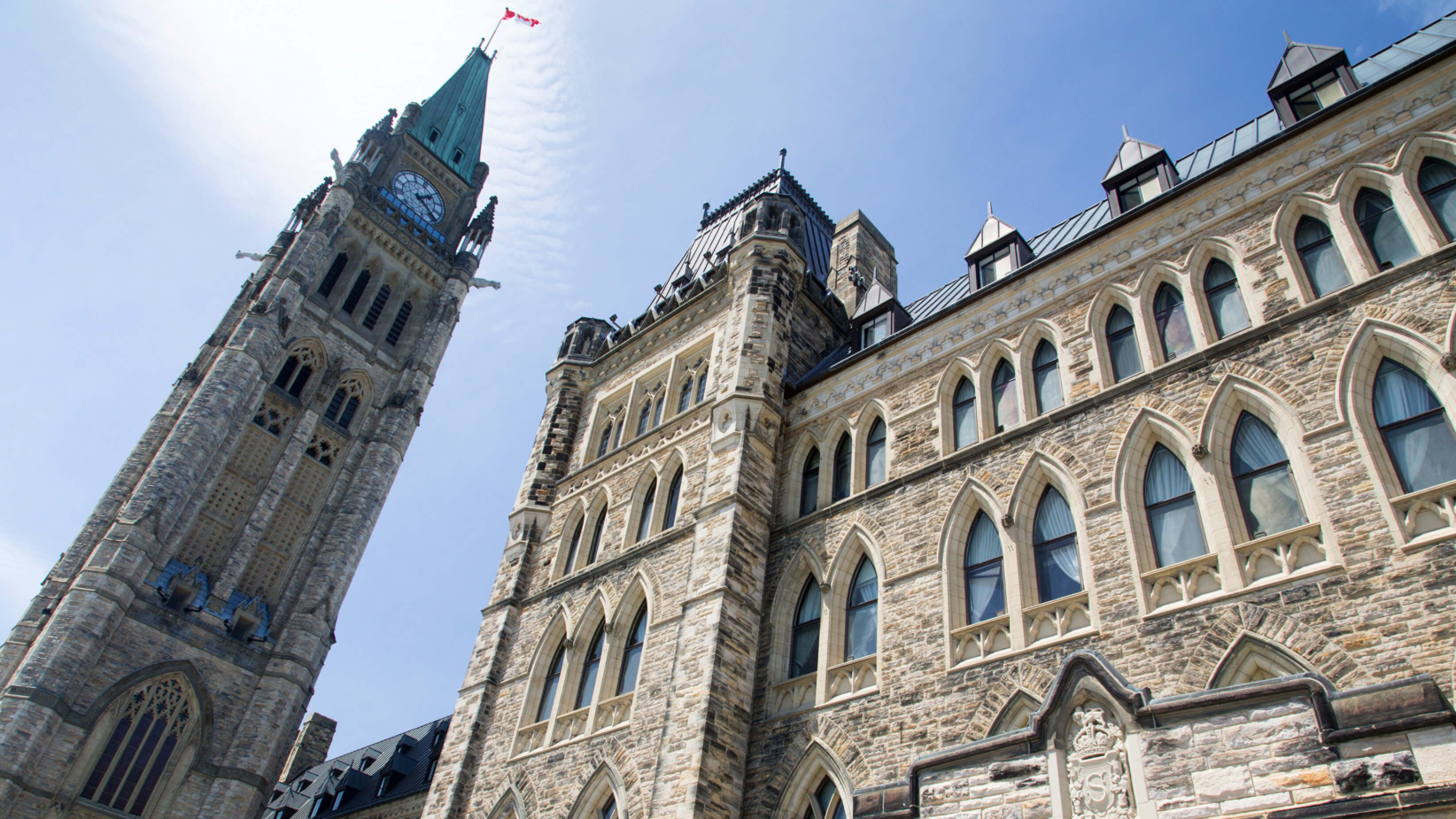Picture of the Peace Tower, and the east block buildings.